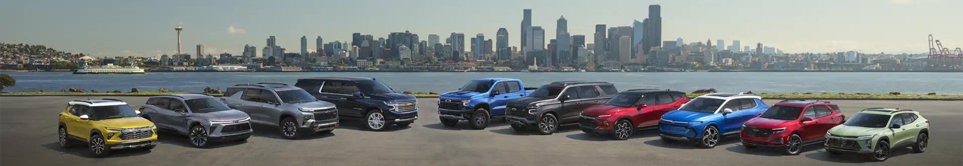 The group of chevrolet vehicles Parked near river side
